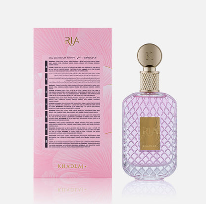 Khadlaj Ria Eau de Parfum box back panel showing the ingredient list in multiple languages, next to the pink quilted bottle